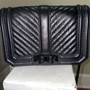 Brand new. Tags still on never worn Rebecca Minkoff crossbody bag.